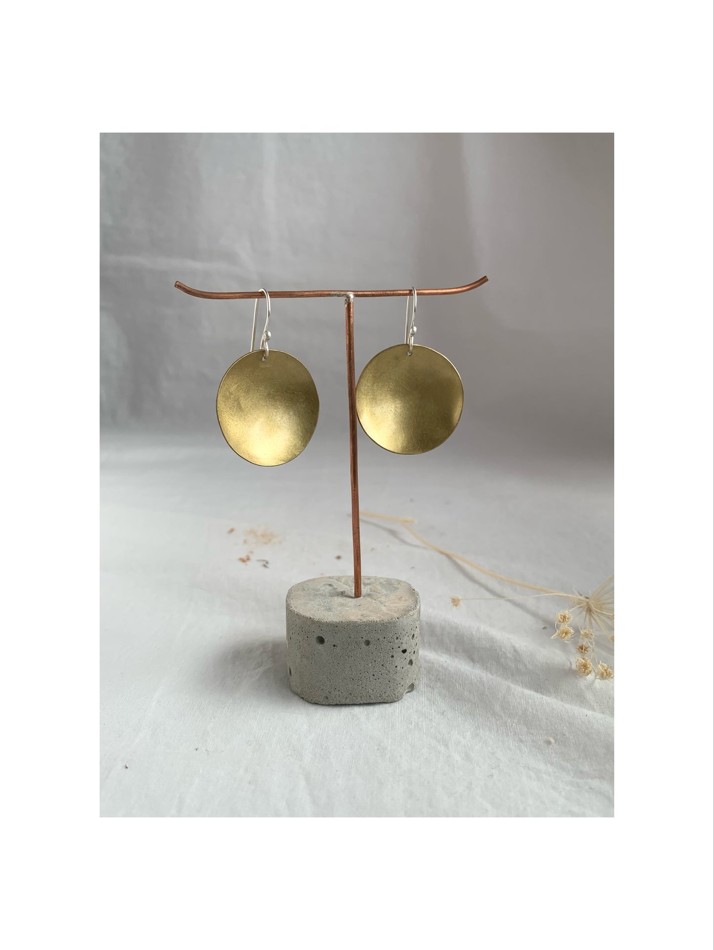 Small Golden Moon drop earrings.